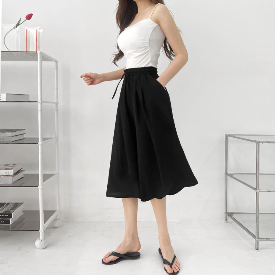 Лёгкие плиссированные кюлоты-юбка с поясом на резинке и двумя защипами