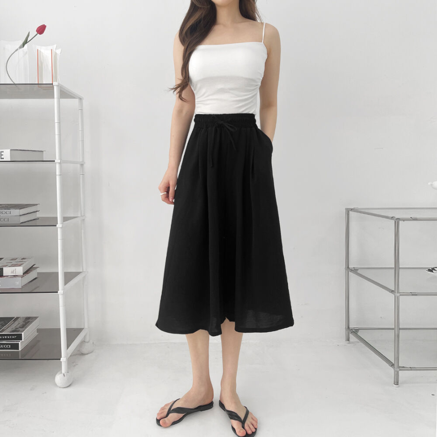 Лёгкие плиссированные кюлоты-юбка с поясом на резинке и двумя защипами