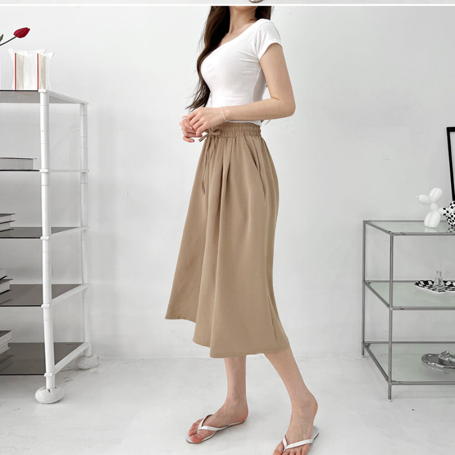 Лёгкие плиссированные кюлоты-юбка с поясом на резинке и двумя защипами