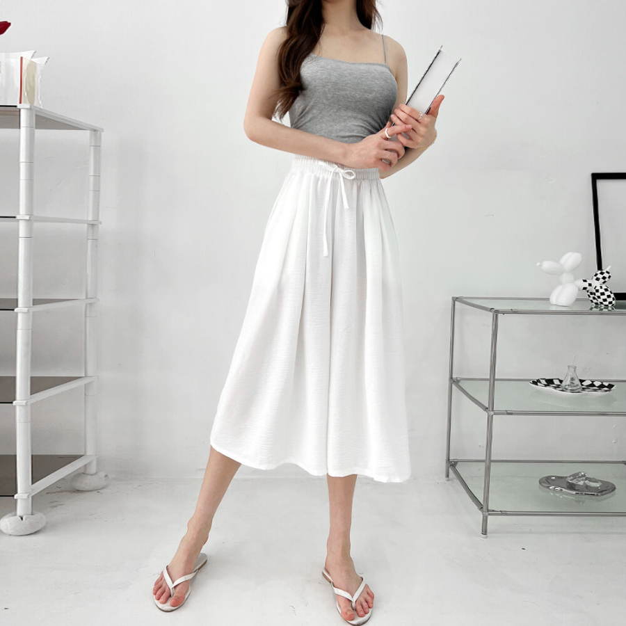 Лёгкие плиссированные кюлоты-юбка с поясом на резинке и двумя защипами