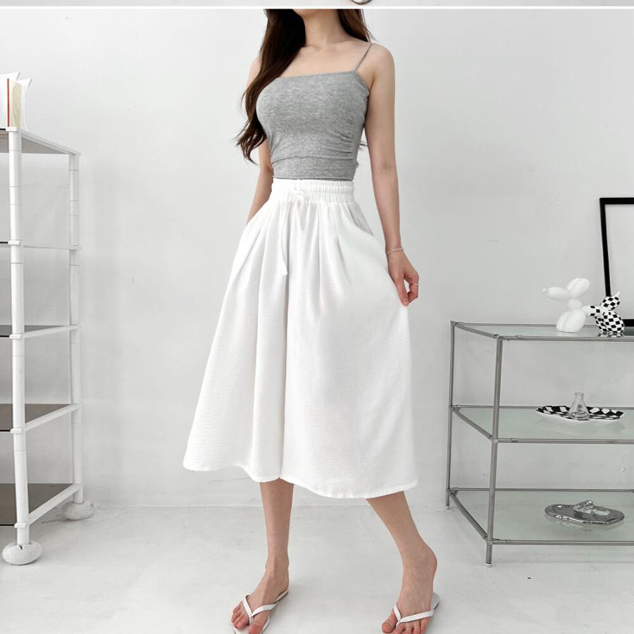 Лёгкие плиссированные кюлоты-юбка с поясом на резинке и двумя защипами