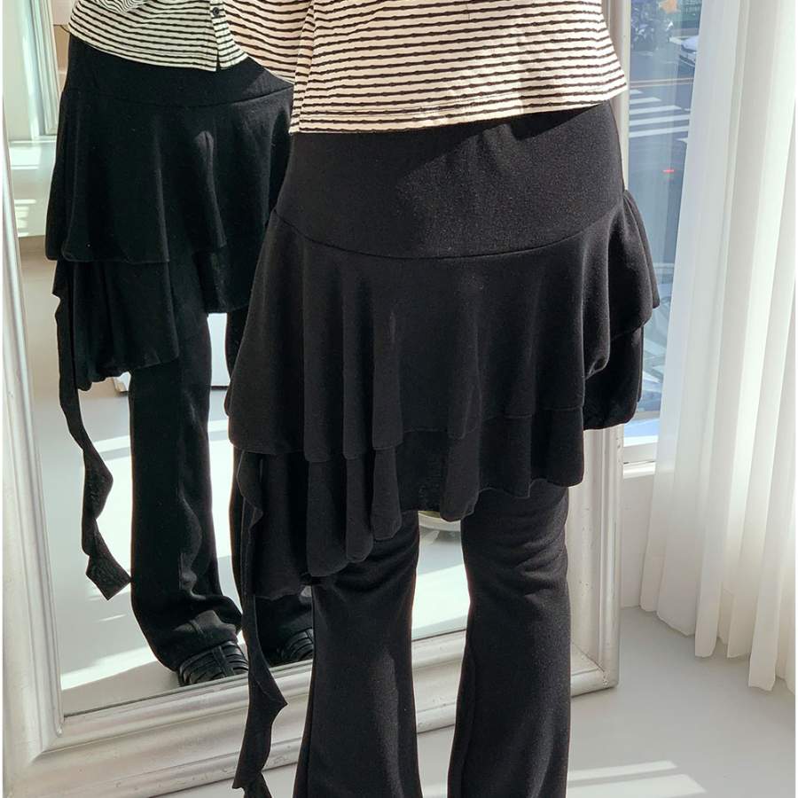 Асимметричная юбка с многослойными воланами и эластичным поясом