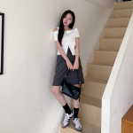 Женская миди-юбка с накладными карманами из нейлона