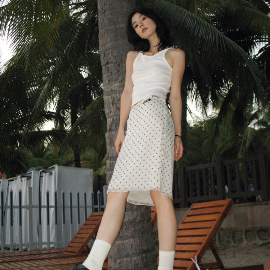 Полупрозрачная миди-юбка в горошек