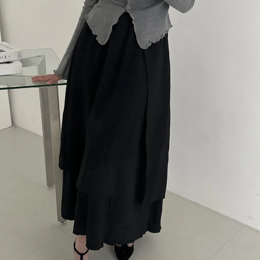 Длинная юбка с эффектом запаха и многослойным дизайном