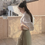 Шифоновая многослойная длинная юбка с разрезом и атласной лентой