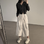 Длинная юбка с карманами и разрезом из нейлона