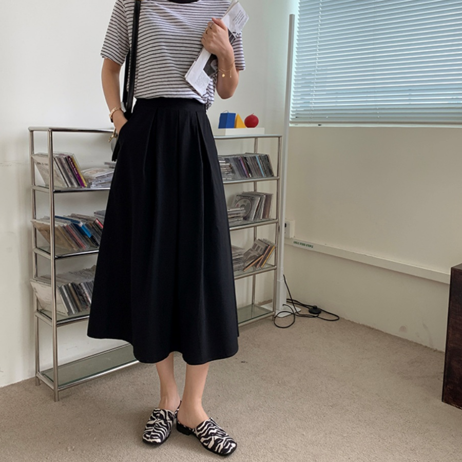 Расклешённая длинная юбка с пинтами