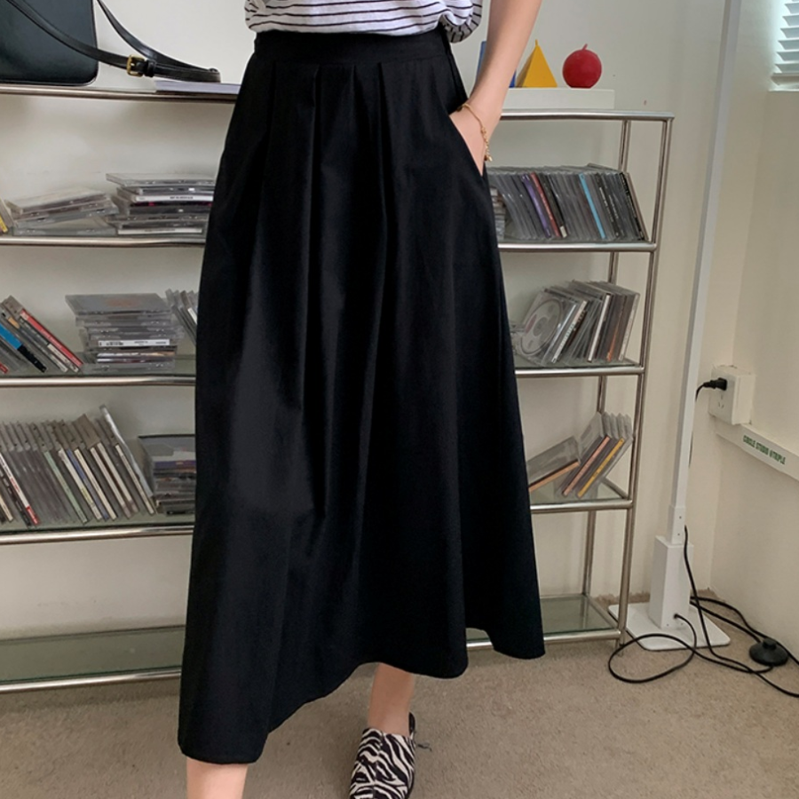 Расклешённая длинная юбка с пинтами