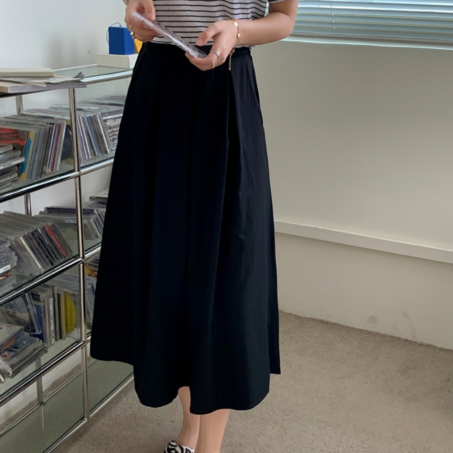 Расклешённая длинная юбка с пинтами