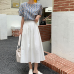 Расклешённая длинная юбка с пинтами