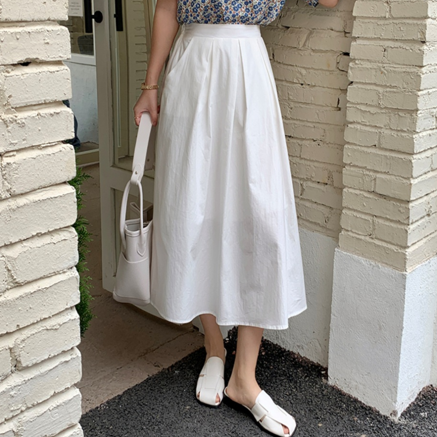 Расклешённая длинная юбка с пинтами