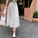 Расклешённая длинная юбка с пинтами