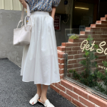 Расклешённая длинная юбка с пинтами