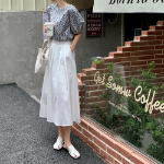 Расклешённая длинная юбка с пинтами