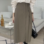 Длинная юбка с бантом "MYKKSK B" — модель-трансформер с запахом и A-силуэтом