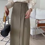 Длинная юбка с бантом "MYKKSK B" — модель-трансформер с запахом и A-силуэтом