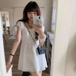 Мини-платье с вышивкой и бантом в айлет-стиле