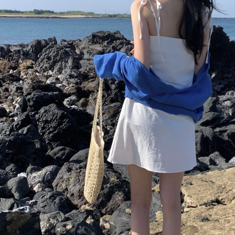 Льняное мини-платье-комбинация с бретелями и бантом