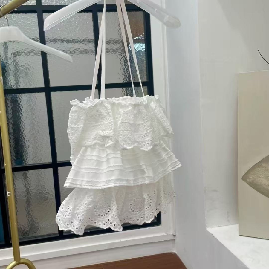 Кружевная сумка через плечо с перфорацией — лёгкий и женственный аксессуар для лета и путешествий