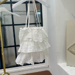 Кружевная сумка через плечо с перфорацией — лёгкий и женственный аксессуар для лета и путешествий