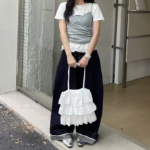 Кружевная сумка через плечо с перфорацией — лёгкий и женственный аксессуар для лета и путешествий