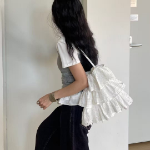 Кружевная сумка через плечо с перфорацией — лёгкий и женственный аксессуар для лета и путешествий