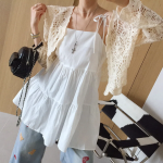 Мини-платье на тонких бретелях в стиле бэстие с А-силуэтом и каскадом складок