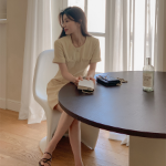 Твидовое мини-платье A-силуэта с круглым вырезом и пуговицами