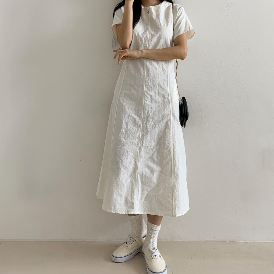 Лёгкое платье из нейлона с задним бантом и карманами