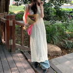 Полупрозрачное вязаное длинное платье с разрезом сзади