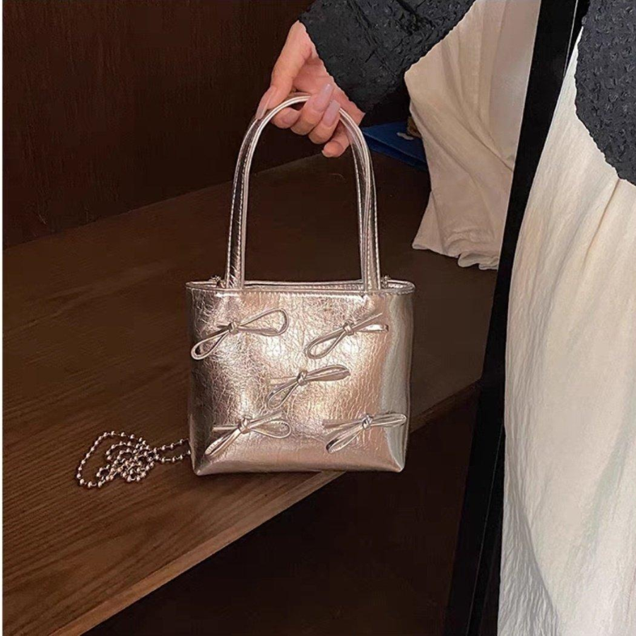 Ribbon Mini Cross Bag — миниатюрная сумка с акцентом на романтичный бант