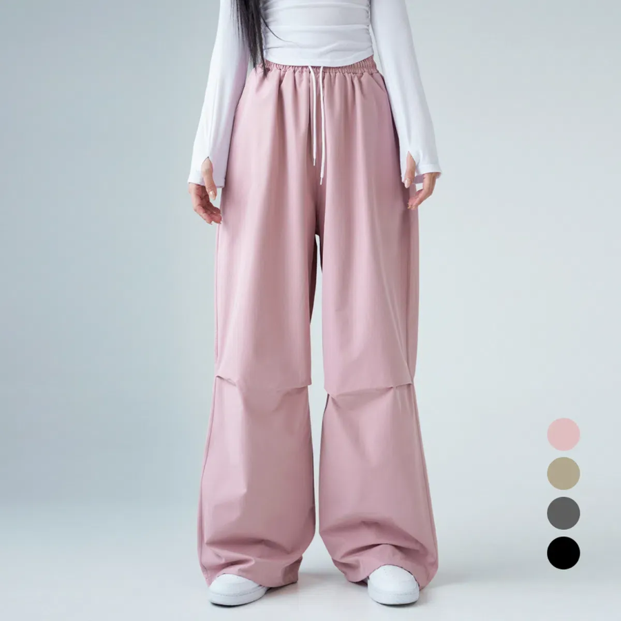 Двусторонние парашютные удлинённые широкие брюки из нейлона