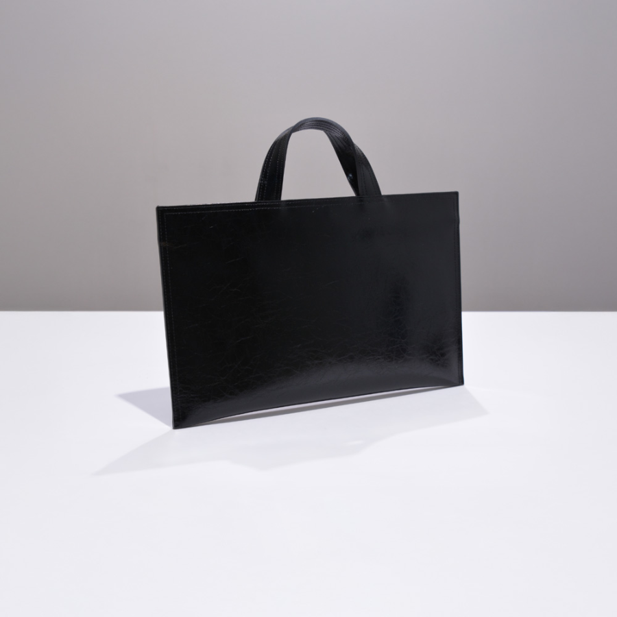 FREAKYNORMAL Enamel Document Bag — строгая форма, смелый глянец