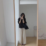 Удлинённая блузка и свободные брюки