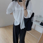 Удлинённая блузка и свободные брюки