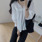 Удлинённая блузка и свободные брюки