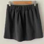 Удлинённая рубашка с бантом и мини-юбка с внутренними шортами