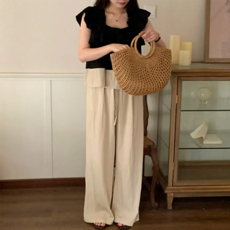 Блузка с контрастной отделкой и широкие брюки с рюшами