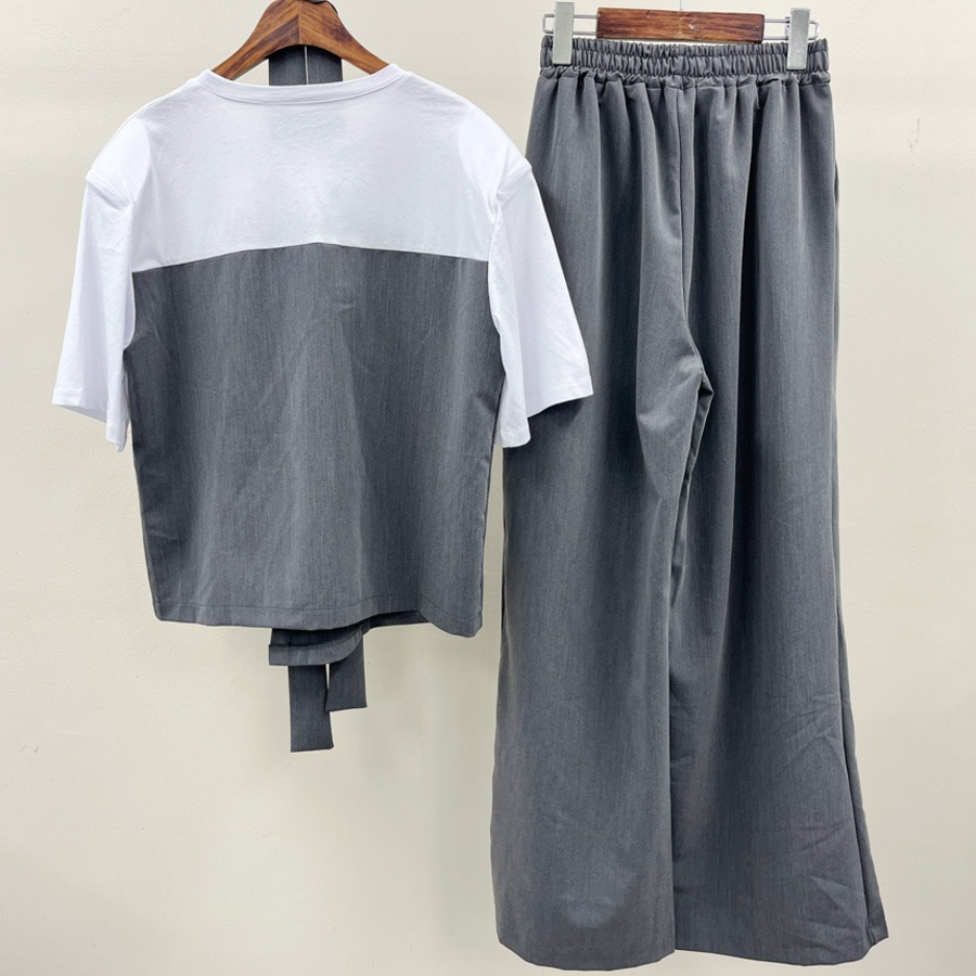 Асимметричный летний костюм из топа с коротким рукавом и широких штанов