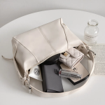 Unique Eyelet Shoulder Bag — оригинальный дизайн с металлическими акцентами