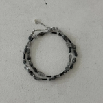 Чёрное колье с дымчатым кристаллом из хирургической стали