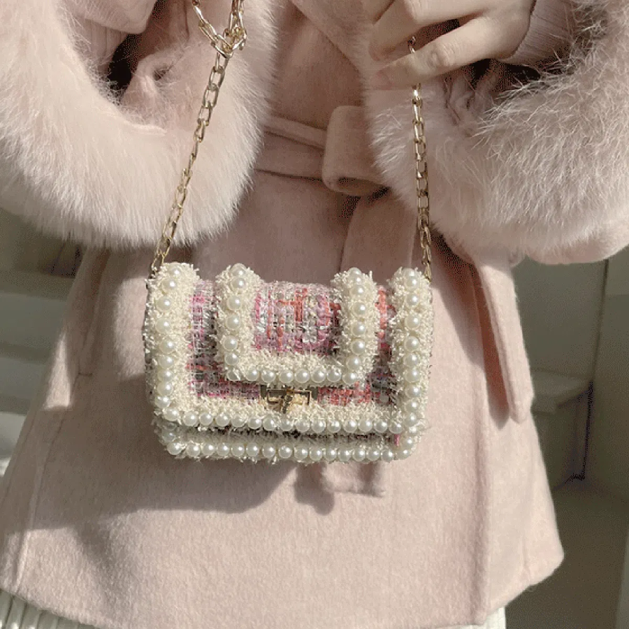 Belt Chain Mini Bag — компактный акцент в образе