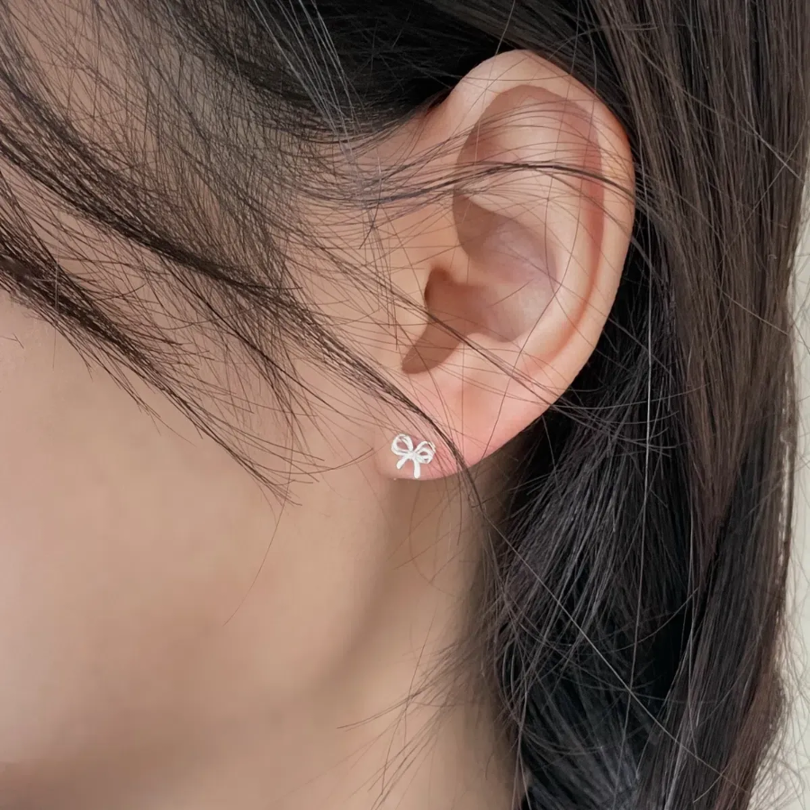 Серьги с двойным бантиком из серебра 925 пробы