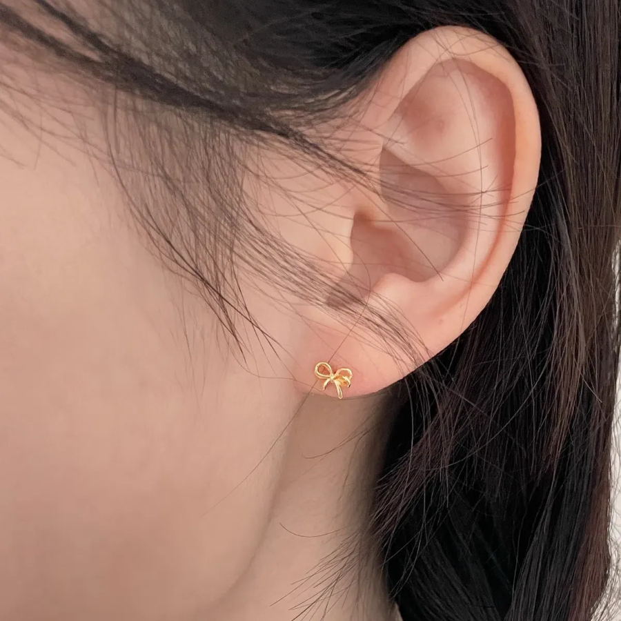 Серьги с двойным бантиком из серебра 925 пробы