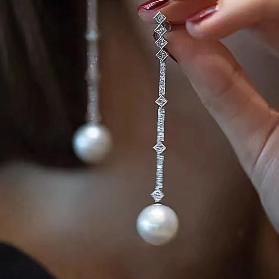 Длинные серьги-капли с жемчугом и кубическим цирконием