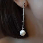 Длинные серьги-капли с жемчугом и кубическим цирконием