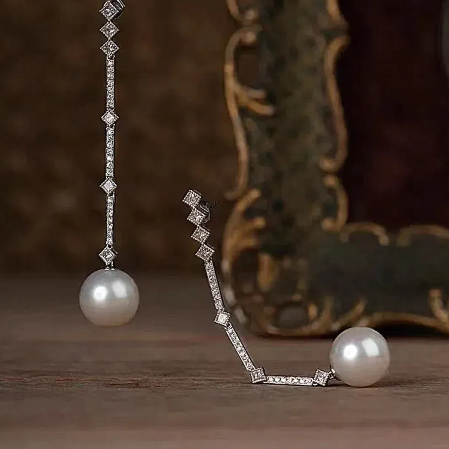 Длинные серьги-капли с жемчугом и кубическим цирконием