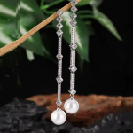 Длинные серьги-капли с жемчугом и кубическим цирконием