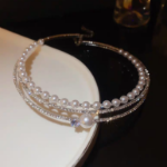 Тройное жемчужное чокер-ожерелье с вставками из кубического циркония